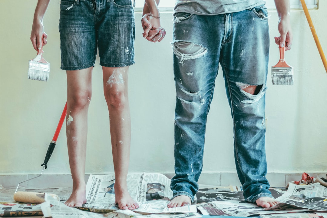 2-person-wearing-blue-denim-jeans-gdwmu0bffs4